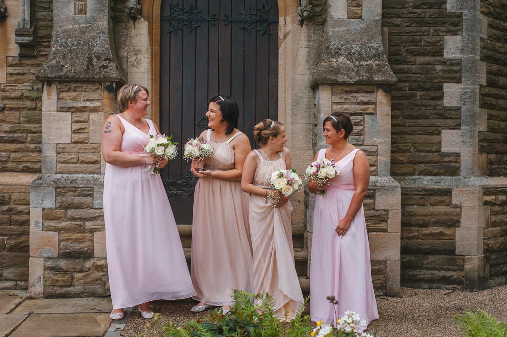 Bridesmaids in pink gowns