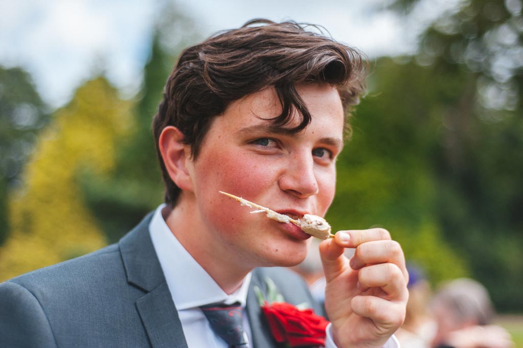 Wedding guest enjoying a snack during wedding at The Parsonage Hotel York