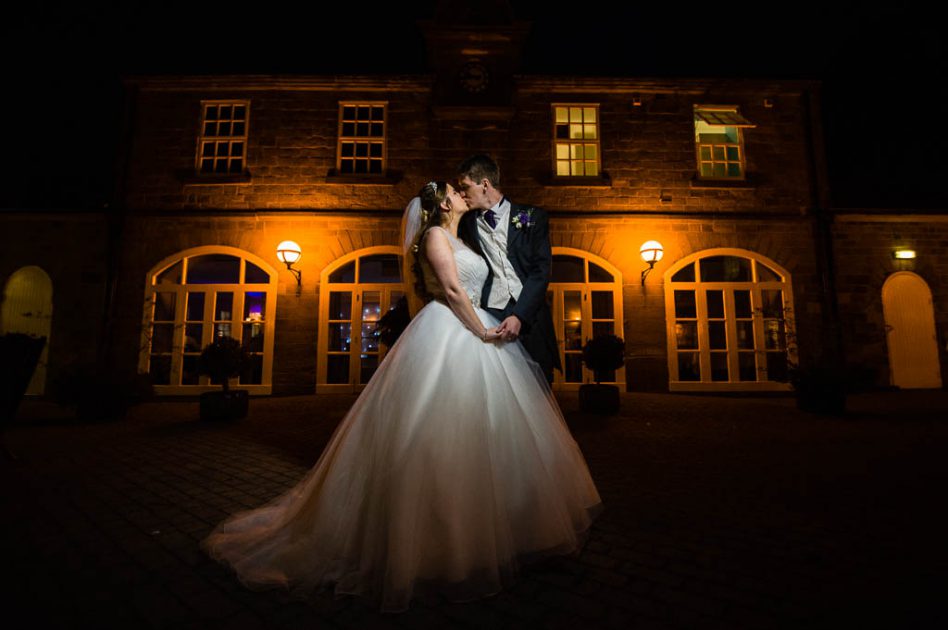 Night time wedding portrait at the Stables