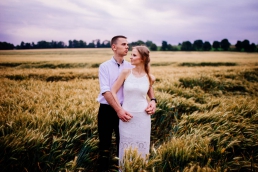 Engagement shoot in a field