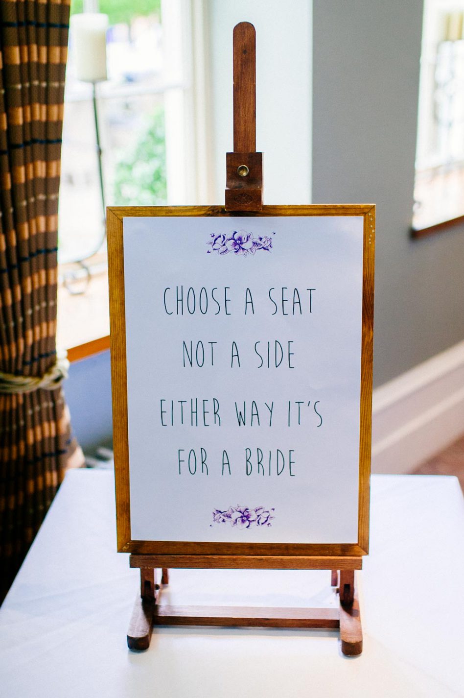 Coose a seat not a side either way it's for a bride