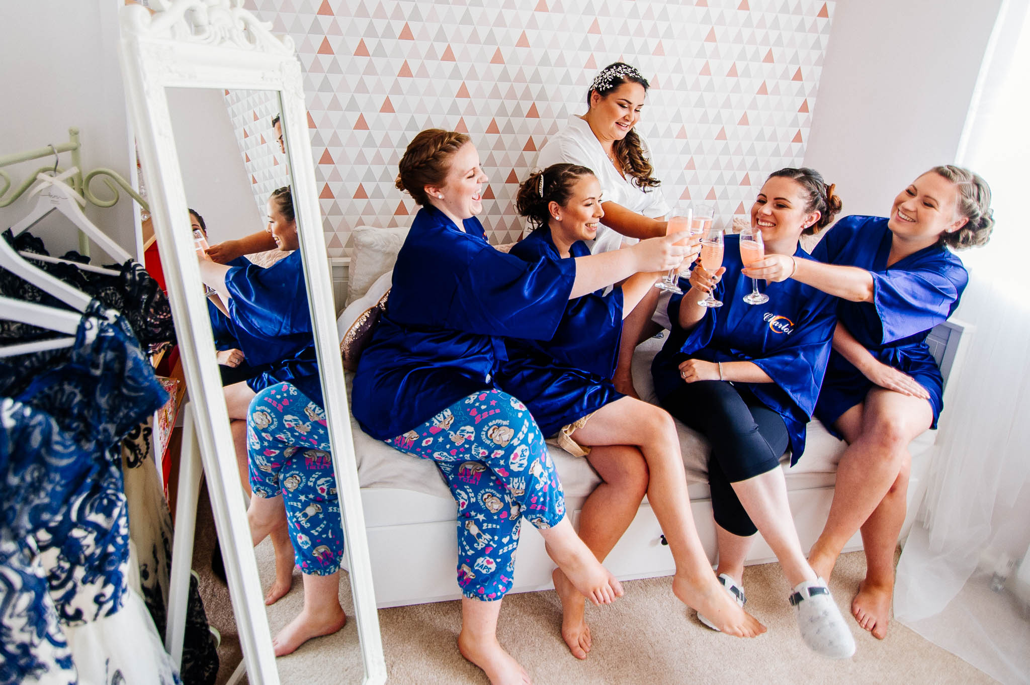 Bride getting ready with bridesmaids