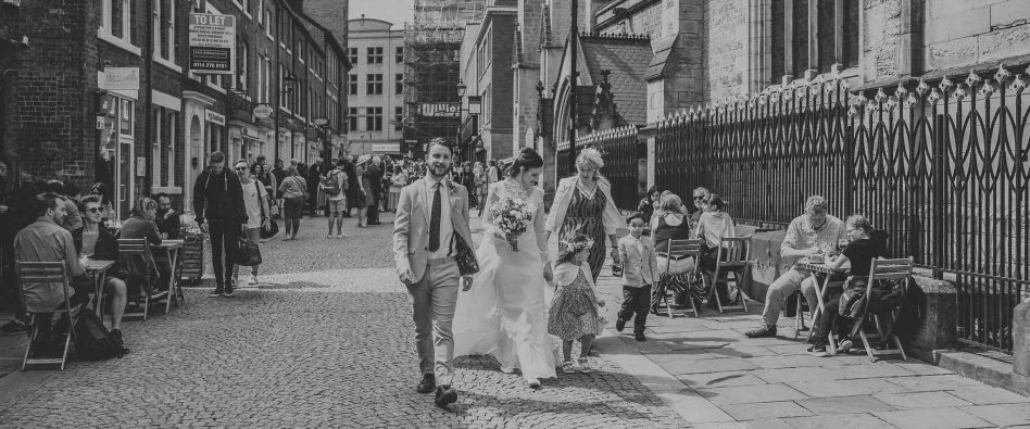Newlyweds walking in Sheffield
