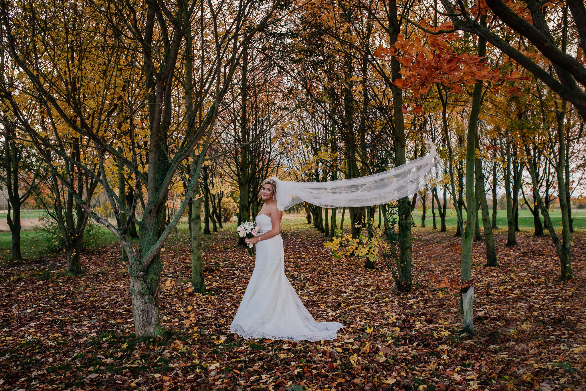 Bride with blowing veil at Owston Hall