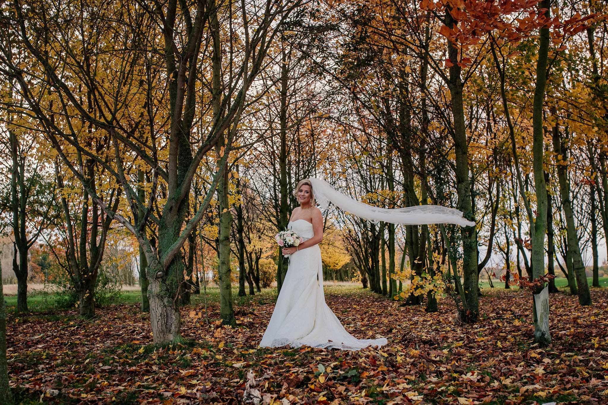 Autumn woodland wedding photos at Owston Hall
