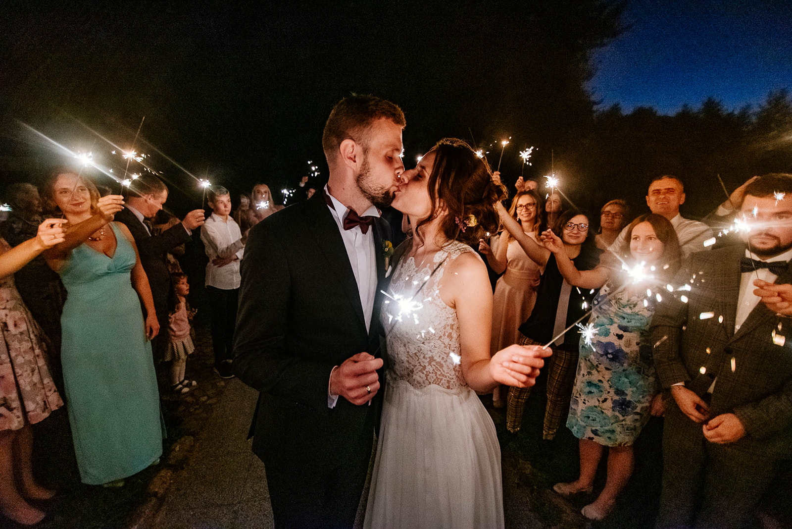 A wedding photo with sparklers