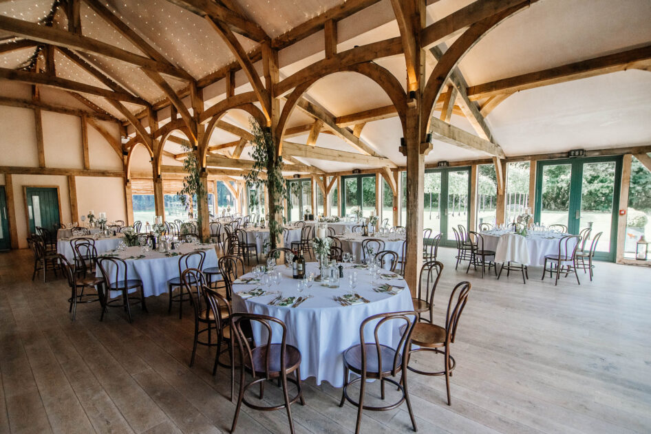 The Oak Room at Hazel Gap Barn  set up for wedding reception.