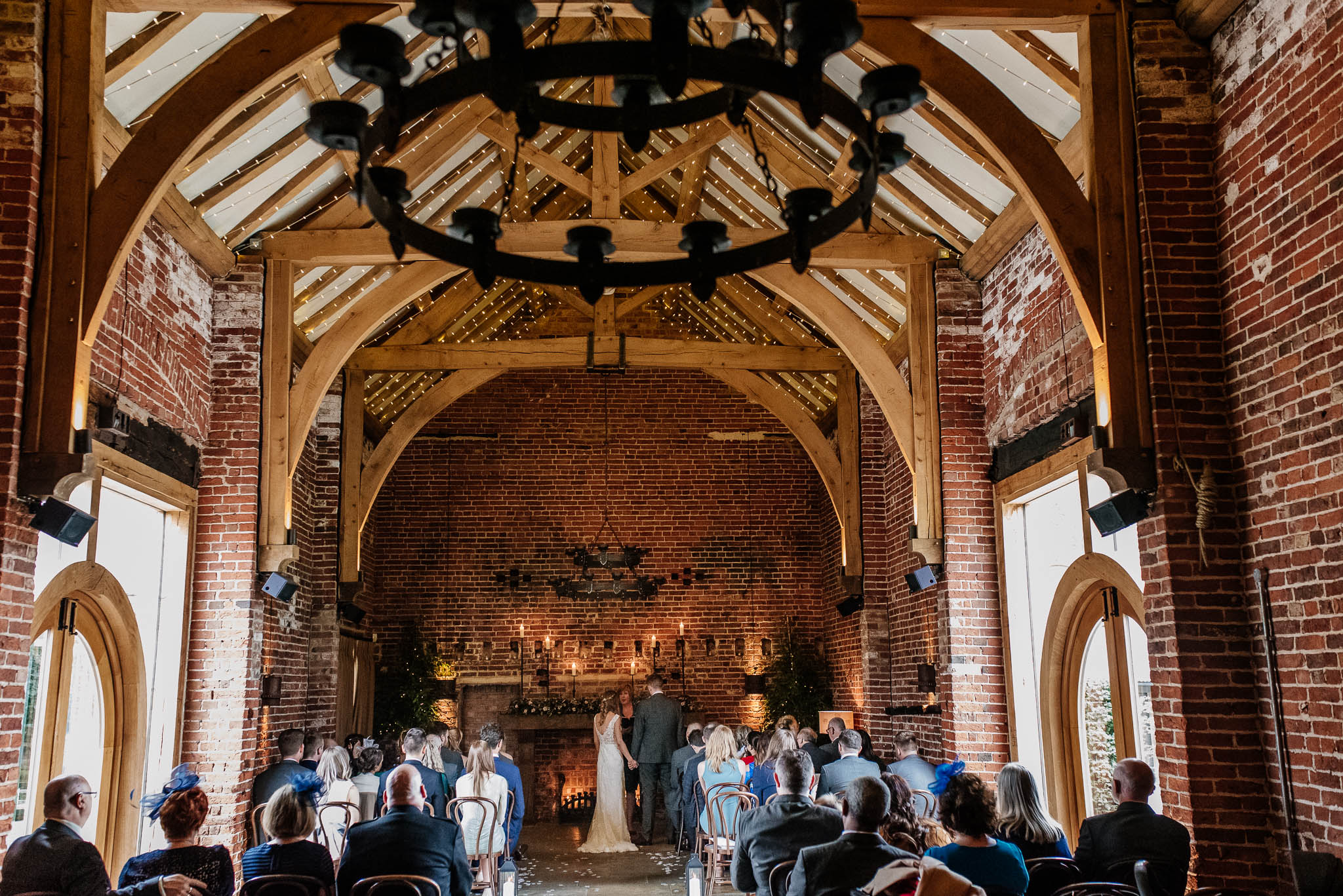 Wedding ceremony in a brick barn
