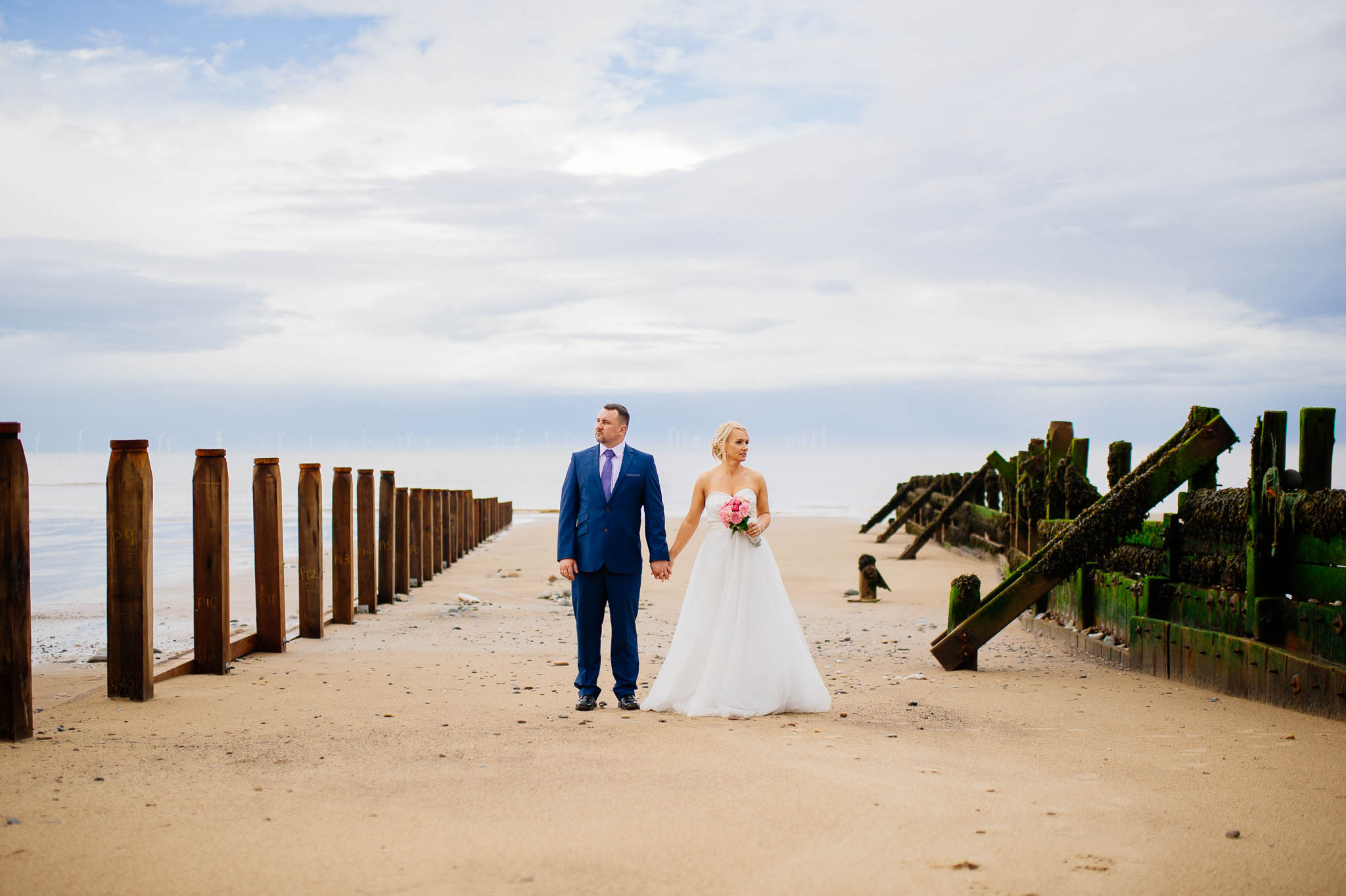 A newly married couple on a beach