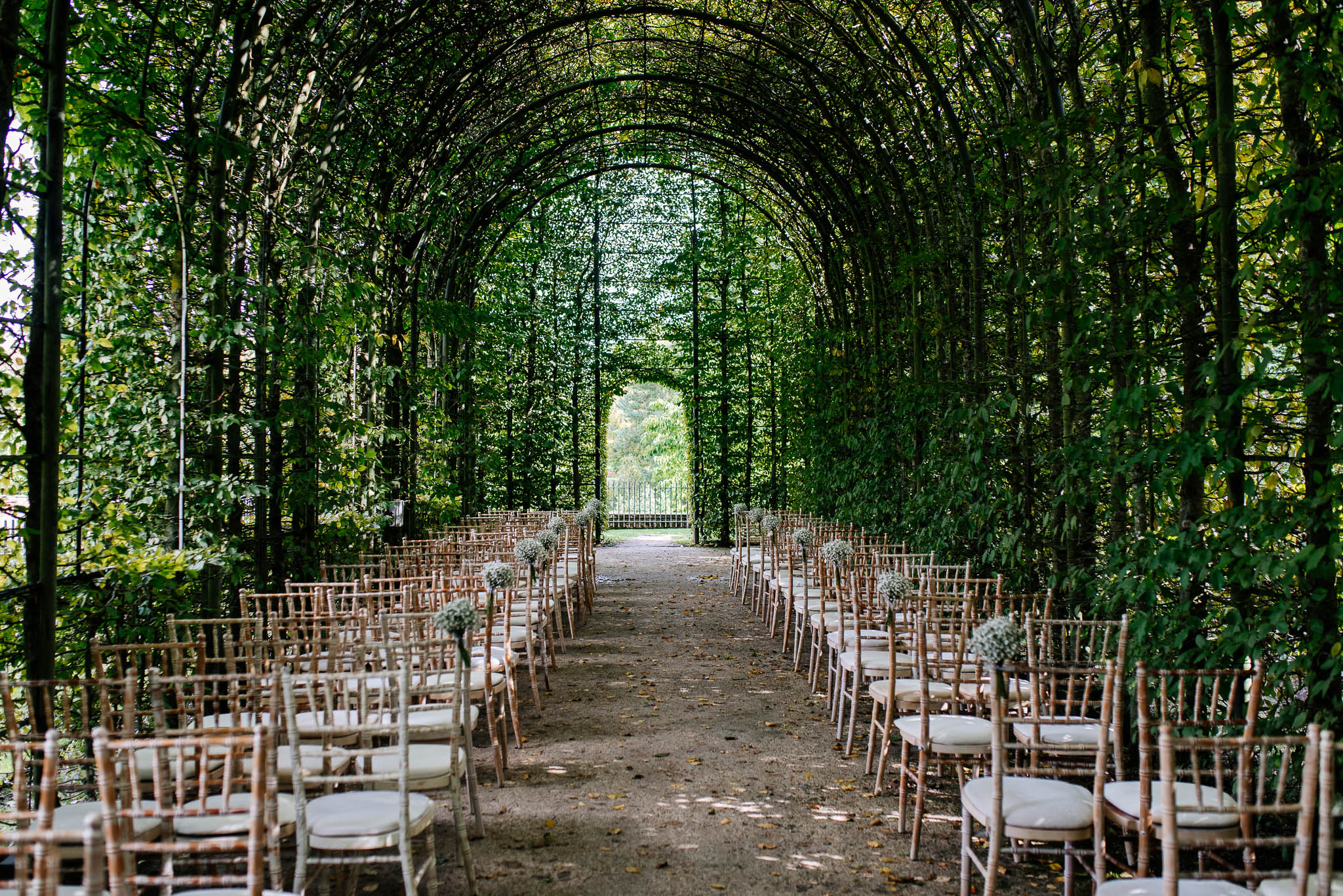 An outdoor wedding venue decorated for a wedding ceremony