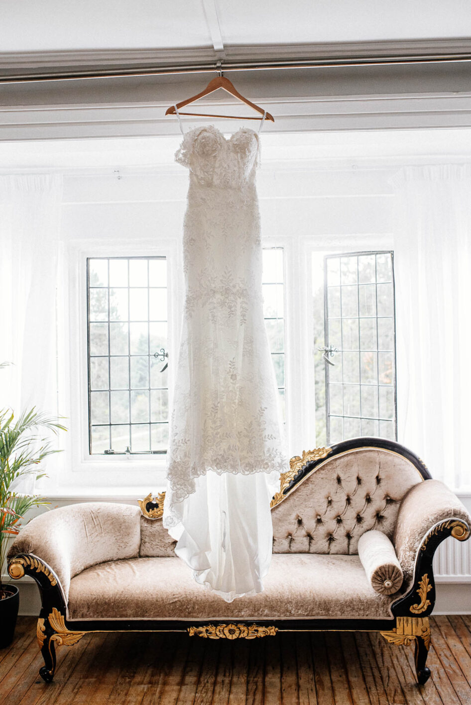 Wedding dress photographed before Whirlow Brook Hall wedding